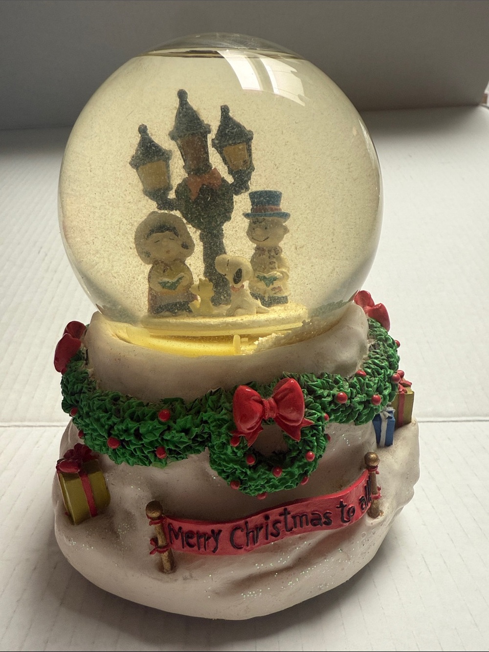 Holiday Snow Globe with Green Wreath and Red Accents
